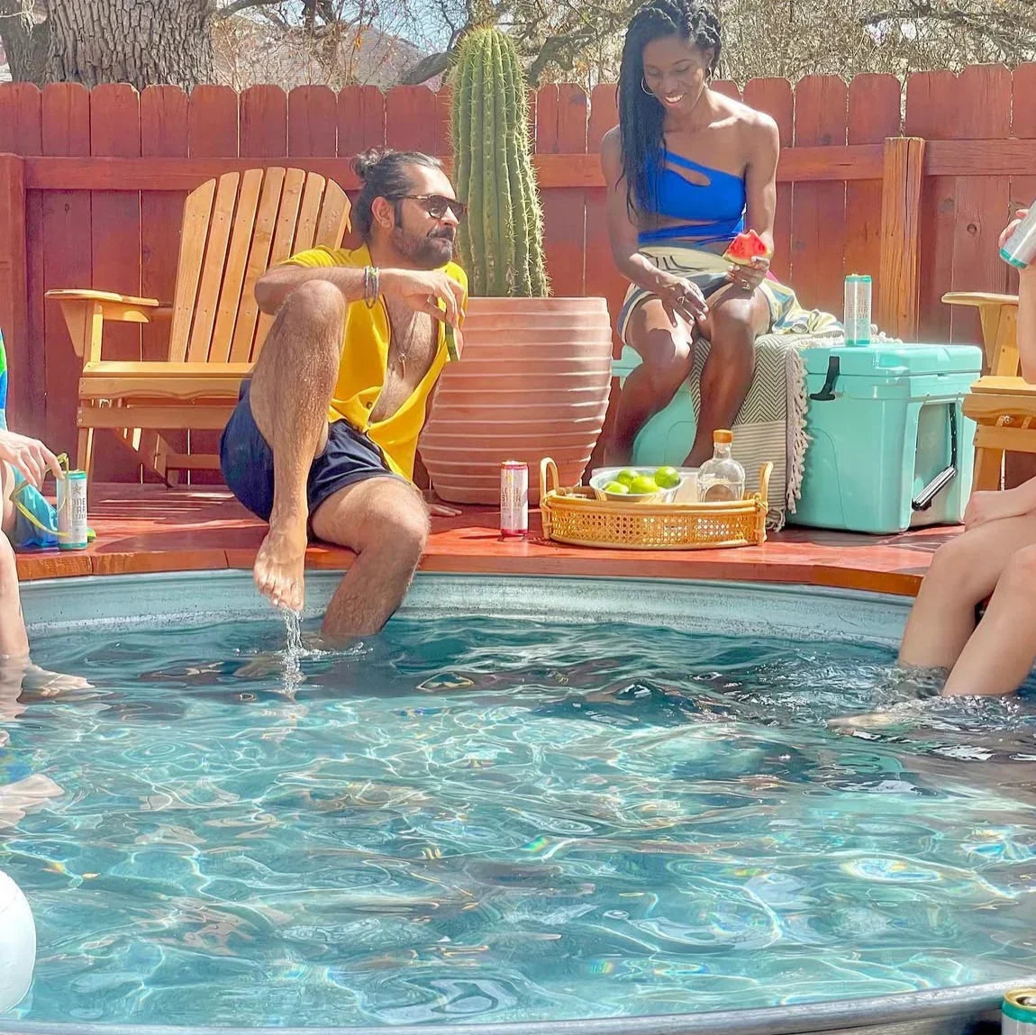 stock tank pool australia install of a backyard pool with decking and people enjoying the summer 